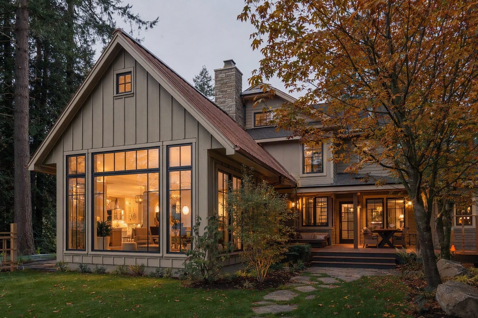 New great-room addition with board-and-batten siding matching a craftsman home